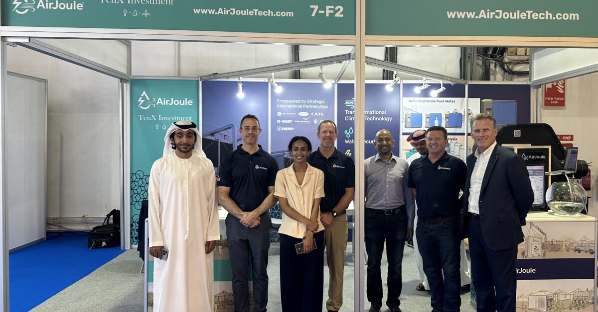 Representatives from Montana Technologies and TenX stand in front of the AirJoule® exhibition booth at the WETEX conference in Dubai.